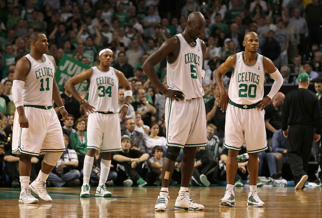 BOSTON - MAY 24:  (L-R) Glen Davis #11, Paul Pierce #34, Kevin Garnett #5 and Ray Allen #20 of the Boston Celtics stand on court late in the game against the Orlando Magic in Game Four of the Eastern Conference Finals during the 2010 NBA Playoffs at TD Ba