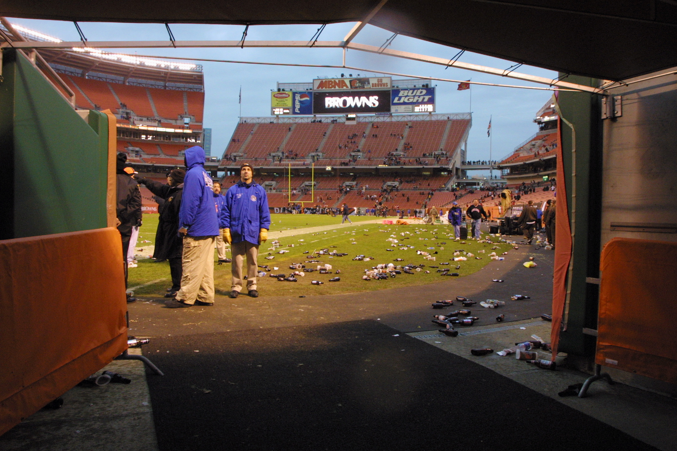 16 Dec 2001 : The field is littered with bottles and debris after fans expressed their displeasure on an officials call by throwing them late in the game between the Cleveland Browns and the Jacksonville Jaguars  at Cleveland Browns Stadium in Cleveland,