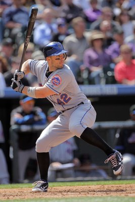 New York Mets batter David Wright (L) comes to bat in the first