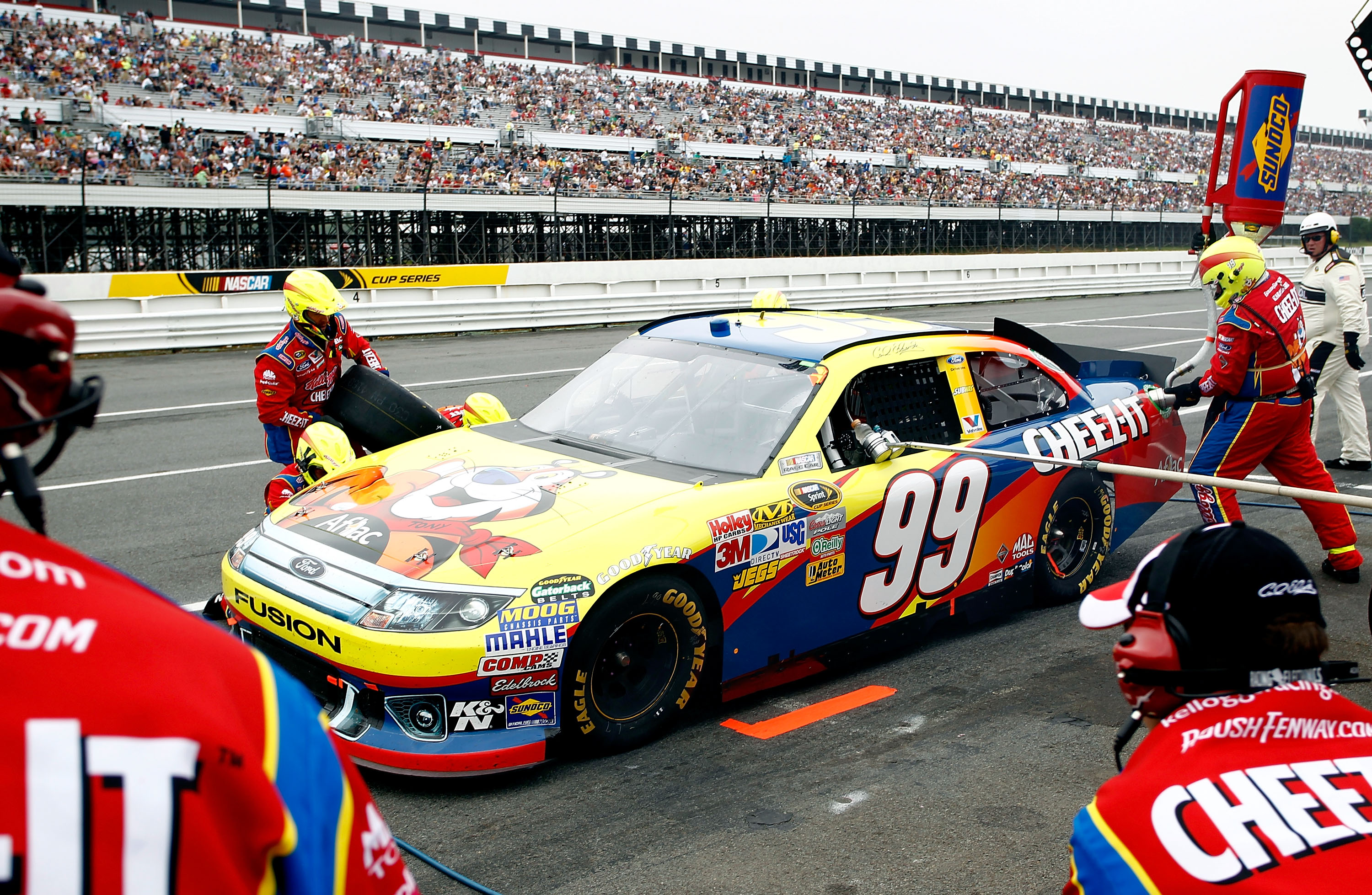 LONG POND, PA - JUNE 12: Carl Edwards, driver of the #99 Kellogg's Ford, comes in for a pit stop during the NASCAR Sprint Cup Series 5-Hour Energy 500 at Pocono Raceway on June 12, 2011 in Long Pond, Pennsylvania.  (Photo by Jeff Zelevansky/Getty Images f