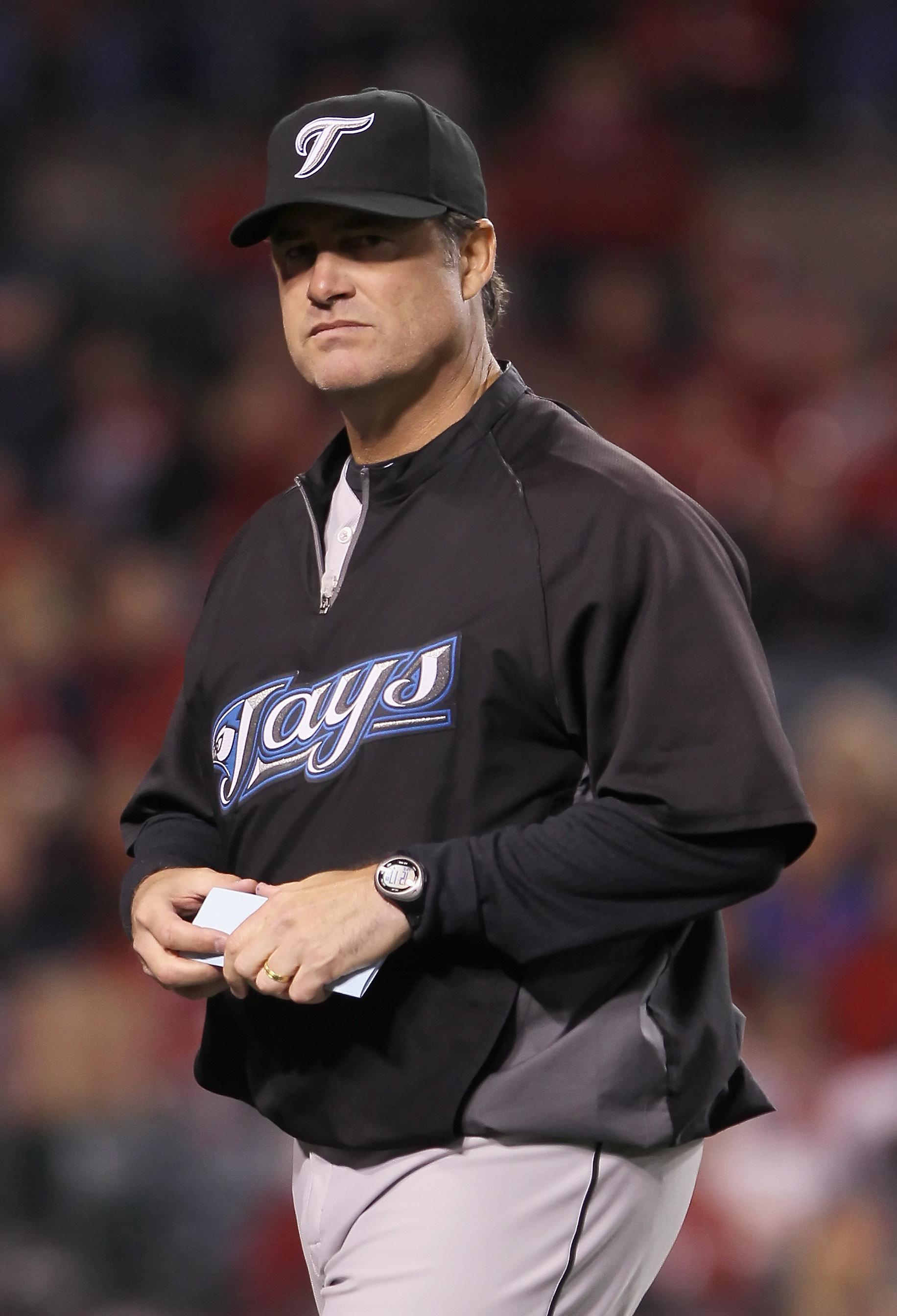 Chicago Cubs manager Lou Piniella reacts after umpire's call on a double  play that ended the Cubs second inning against the Colorado Rockies at  Coors Field in Denver on August 9, 2009.