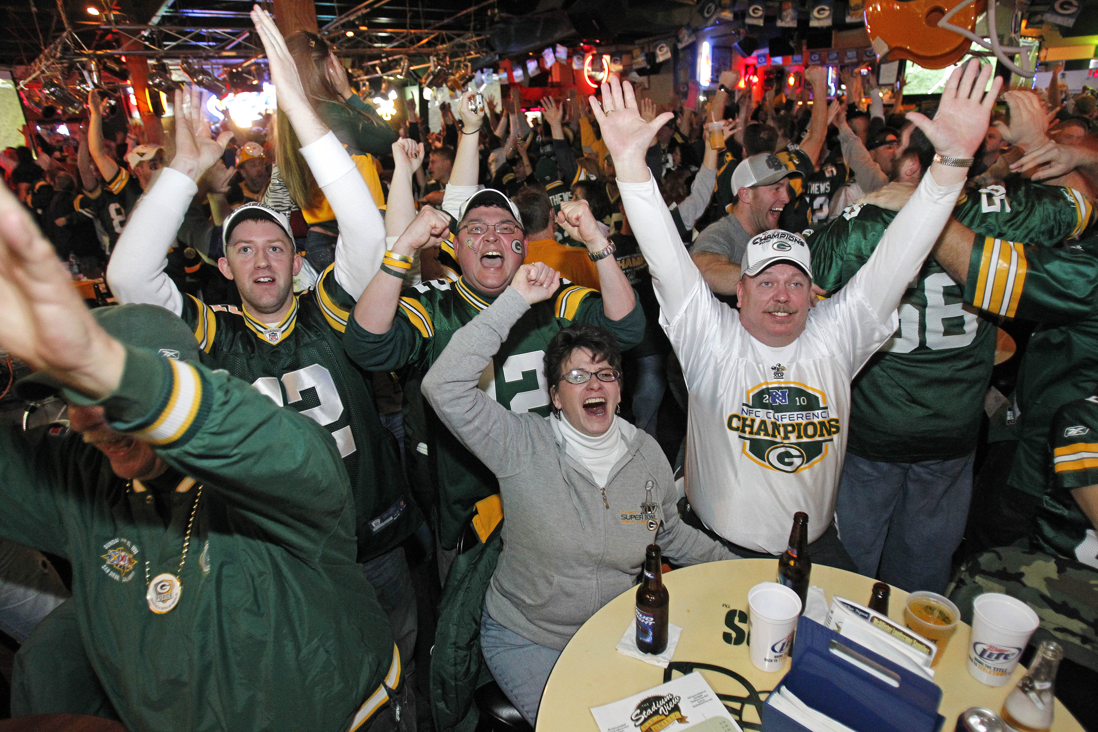 GREEN BAY, WI - FEBRUARY 06: Green Bay Packers fans react after watching the Green Bay Packers defeat the Pittsburgh Steelers in the Super Bowl at Stadium View Bar February 6, 2011 in Green Bay, Wisconsin.  (Photo by Matt Ludtke/Getty Images)