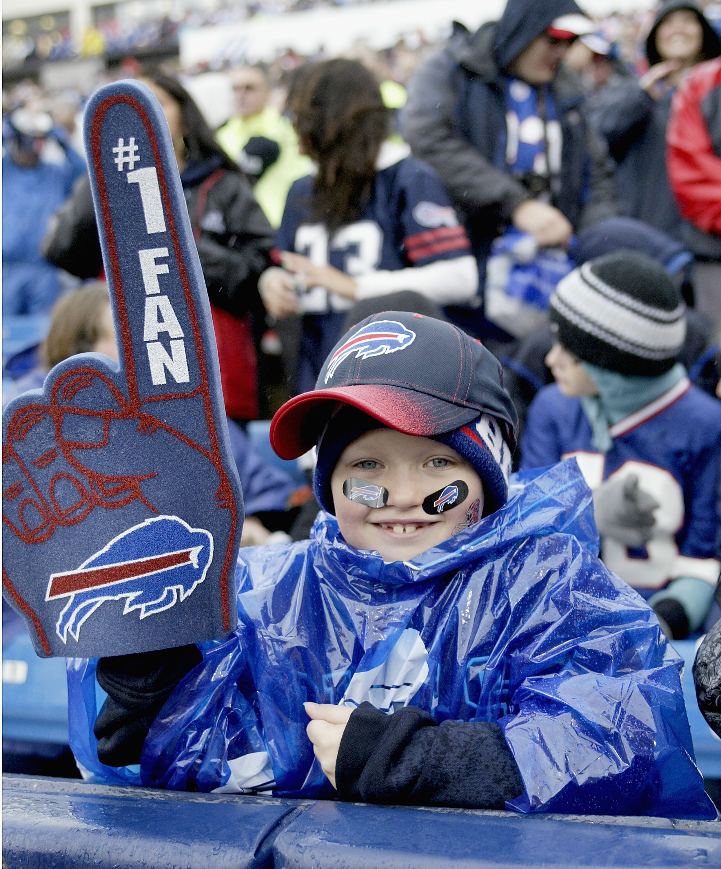 ORCHARD PARK, NY - OCTOBER 03: A young Buffalo Bills fan shows his support against the New York Jets   at Ralph Wilson Stadium on October 3, 2010 in Orchard Park, New York. The Jets won 38-14. (Photo by Rick Stewart/Getty Images)