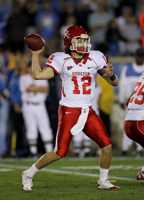 PASADENA, CA - SEPTEMBER 18: Quarterback Cotton Turner #12 of the Houston Cougars throws a pass against the UCLA Bruins at the Rose Bowl on September 18, 2010 in Pasadena, California. UCLA won 31-13. (Photo by Stephen Dunn/Getty Images)