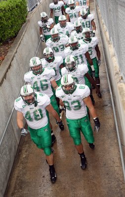 HOUSTON - NOVEMBER 17: The Marshall Thundering Herd hold a rope as they walk down the ramp to take the field for the game with the Houston Cougars at Robertson Stadium November 17, 2007 in Houston, Texas. Houston won 35-28. (Photo by Stephen Dunn/Getty Im