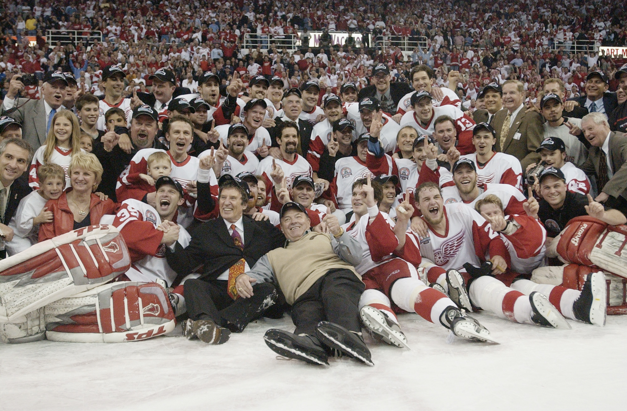 DETROIT, MI - JUNE 13:  The Detroit Red Wings take a team photo while celebrating winning the Stanley Cup after eliminating the Carolina Hurricanes during game five of the NHL Stanley Cup Finals on June 13, 2002 at the Joe Louis Arena in Detroit, Michigan