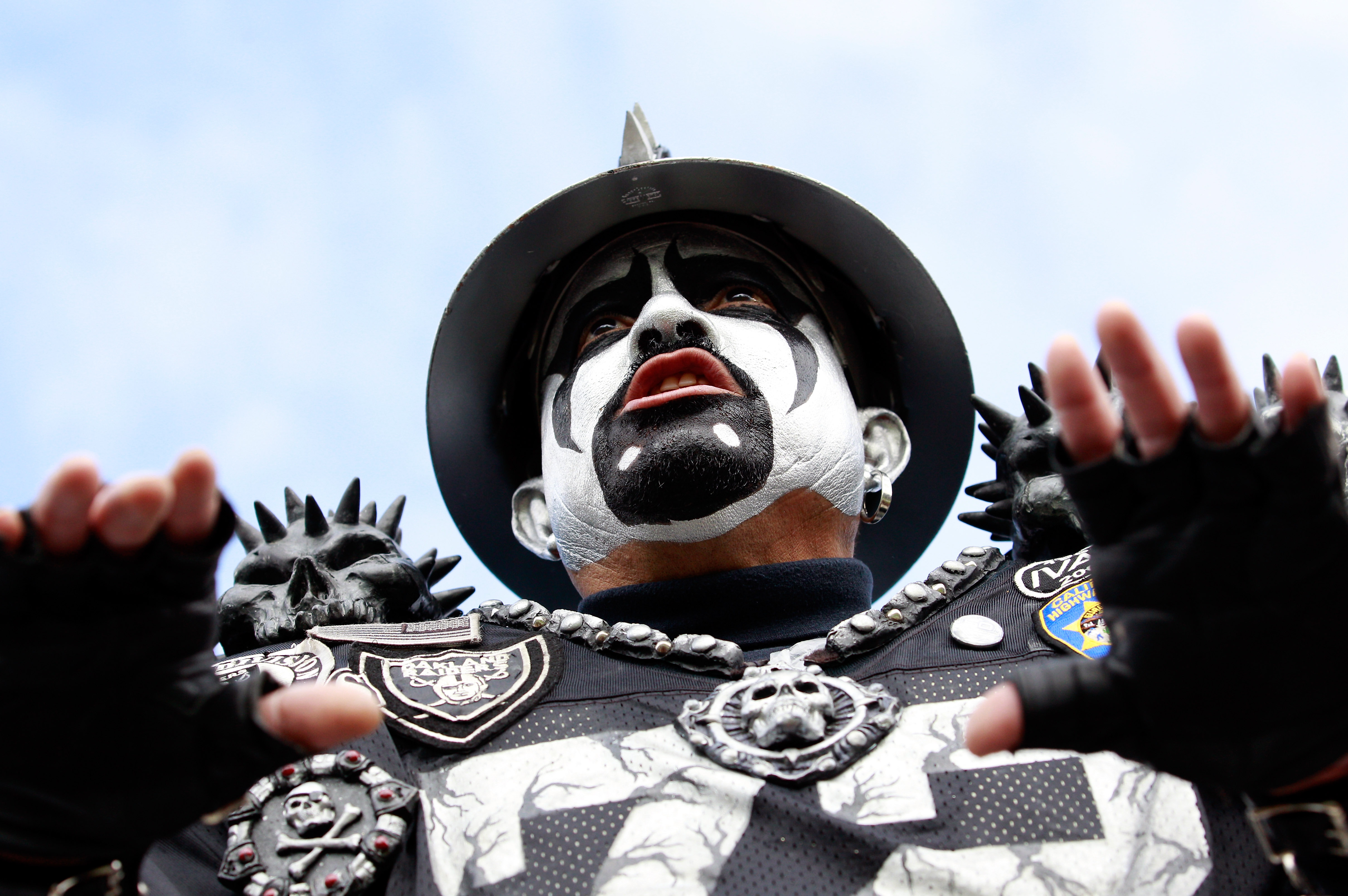 JACKSONVILLE, FL - DECEMBER 12:  A fan of the Oakland Raiders cheers during the game against the Jacksonville Jaguars at EverBank Field on December 12, 2010 in Jacksonville, Florida.  (Photo by Sam Greenwood/Getty Images)