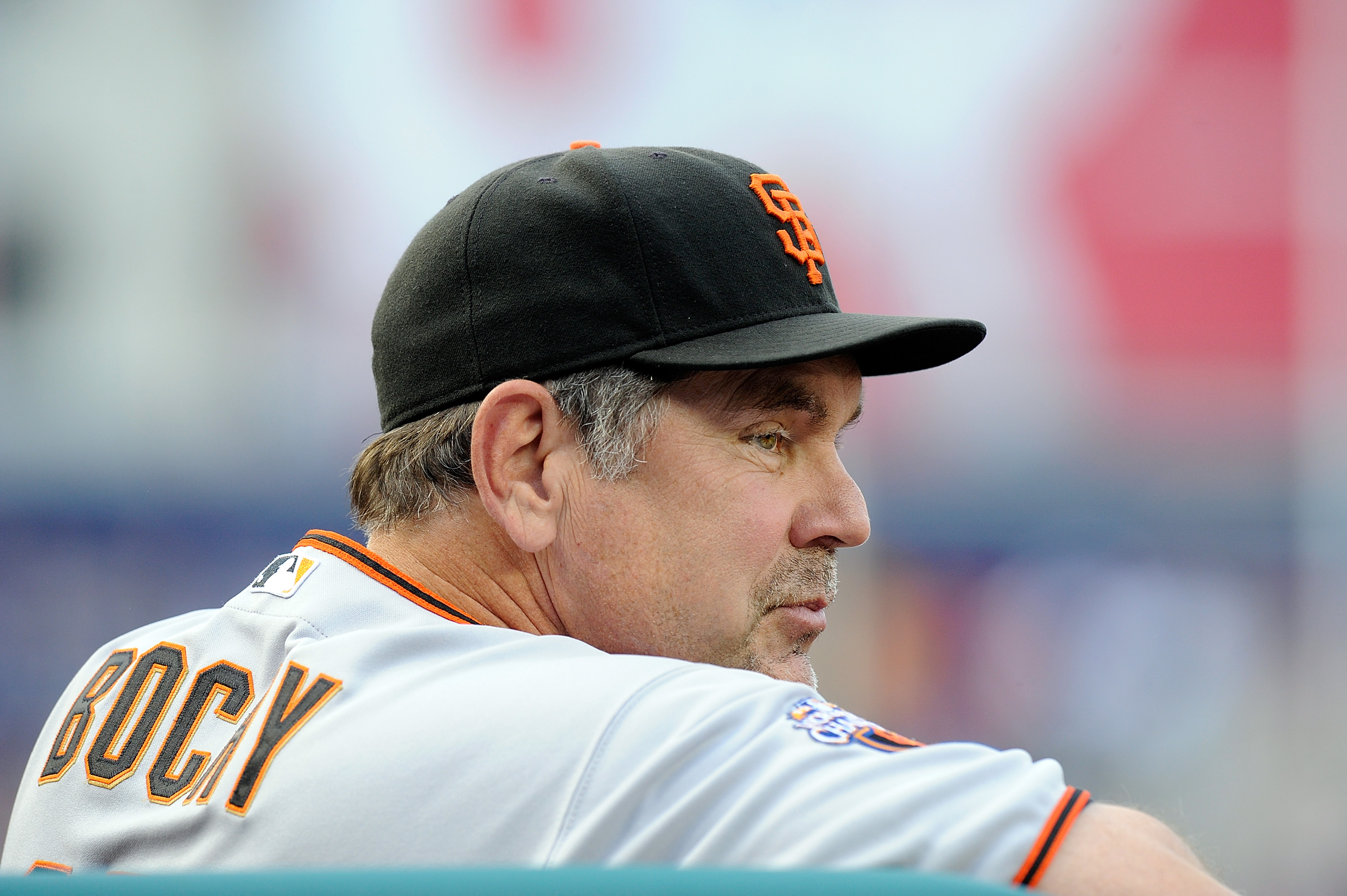 WASHINGTON, DC - July 08: Texas Rangers manager Bruce Bochy (15) sits in  the dugout prior to the Texas Rangers versus the Washington Nationals on  July 8, 2023 at Nationals Park in