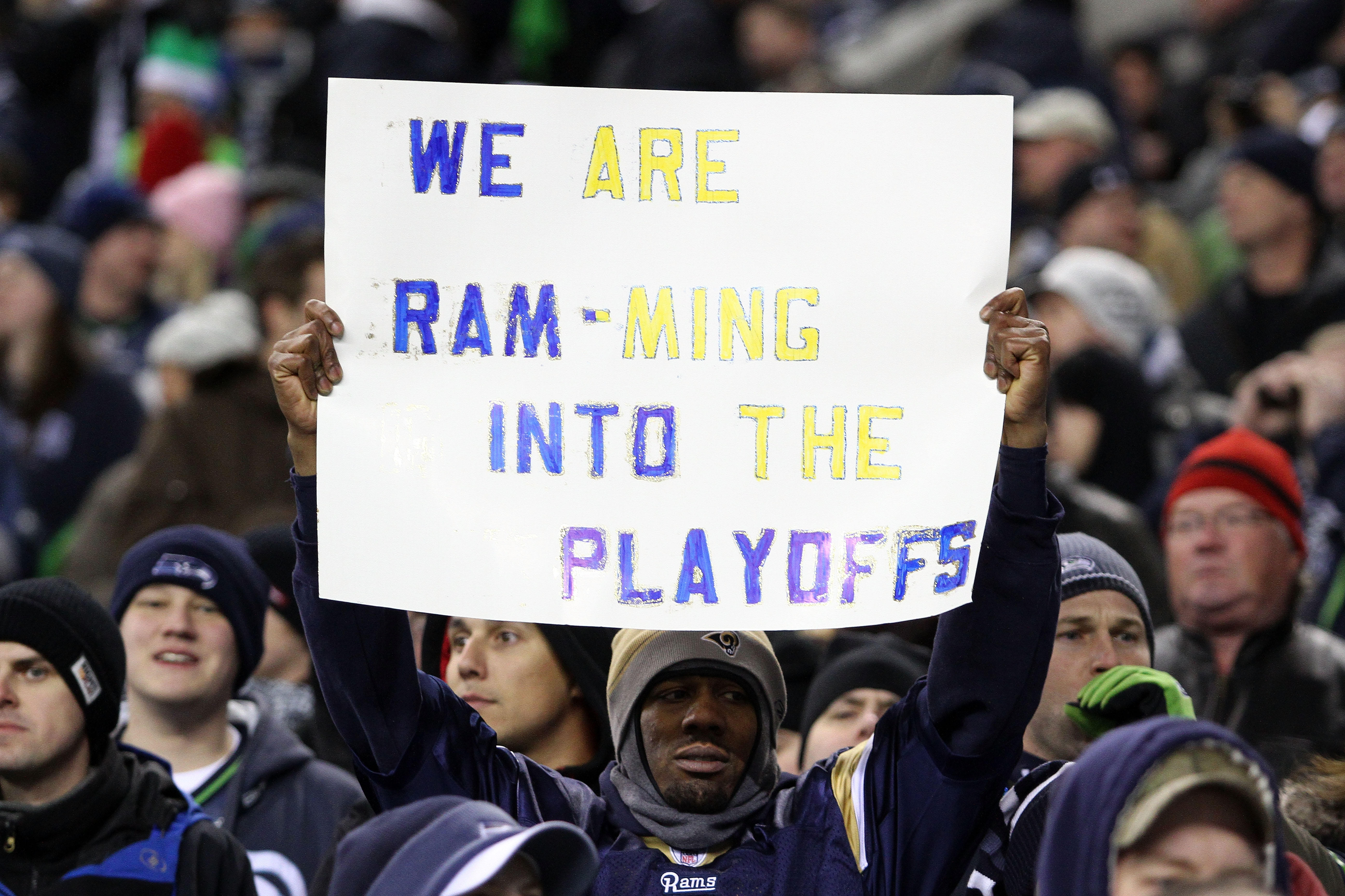 SEATTLE, WA - JANUARY 02:  A fan of the St. Louis Rams holds a sign during the game against the Seattle Seahawks at Qwest Field on January 2, 2011 in Seattle, Washington.  (Photo by Otto Greule Jr/Getty Images)