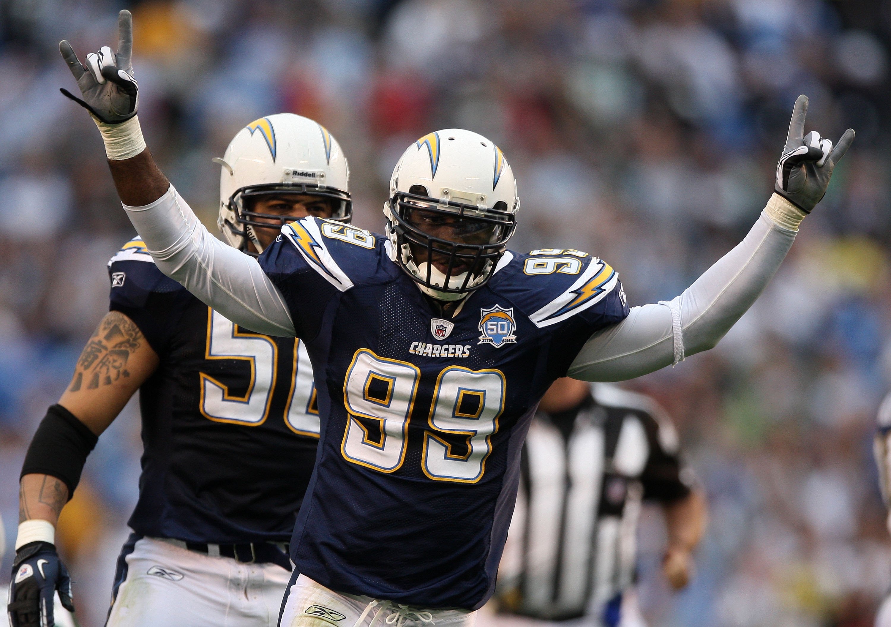 San Diego Chargers linebacker Kevin Burnett, right, runs for