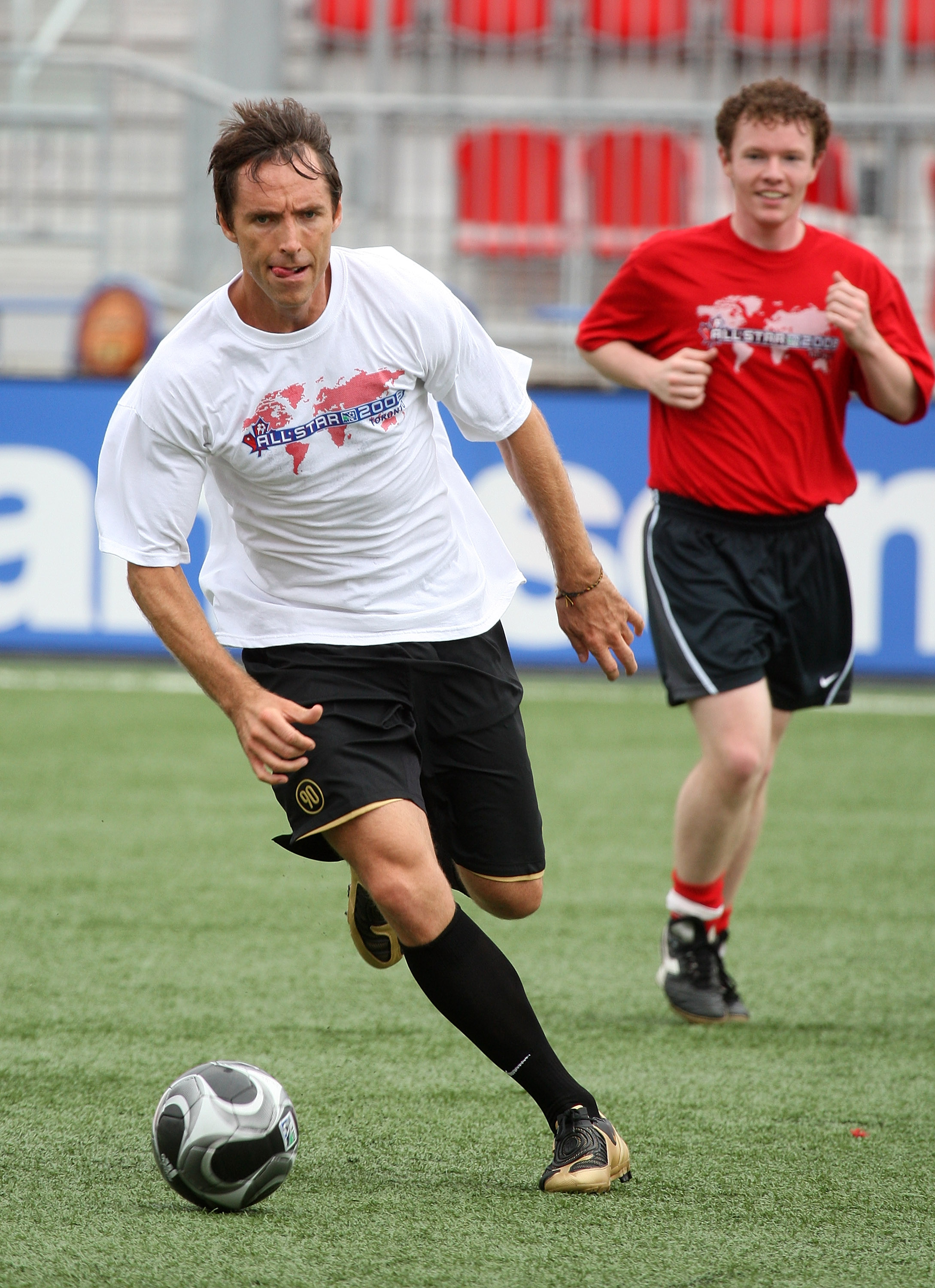 TORONTO - JULY 24:  NBA basketball player Steve Nash plays soccer with members of the media during the MLS All Star Media Game at BMO Field on July 24, 2008 in Toronto, Canada.  (Photo by Claus Andersen/Getty Images)