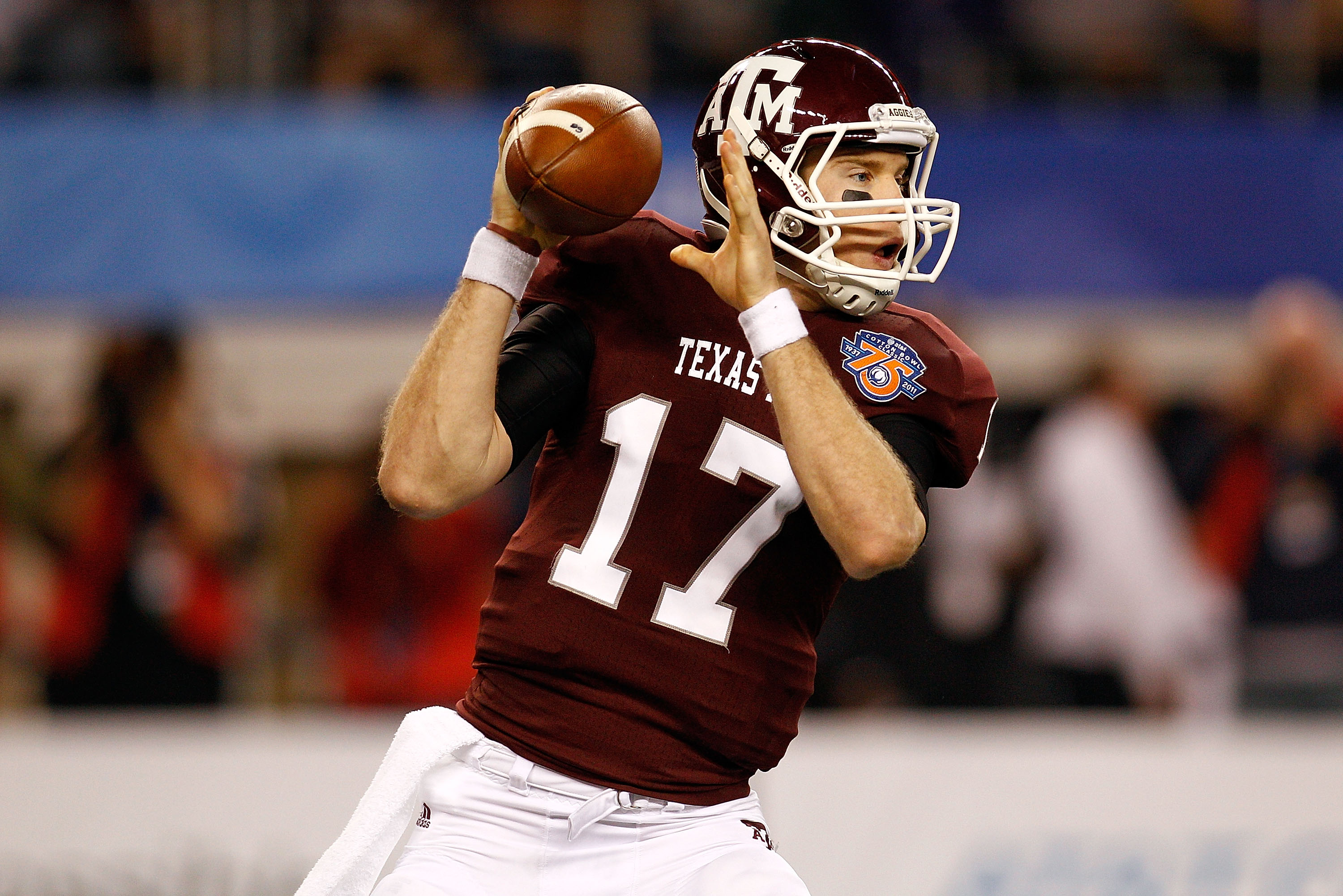 ARLINGTON, TX - JANUARY 07:  Quarterback Ryan Tannehill #17 of the Texas A&M Aggies looks to throw a pass against the Louisiana State University Tigers during the AT&T Cotton Bowl at Cowboys Stadium on January 7, 2011 in Arlington, Texas.  (Photo by Chris