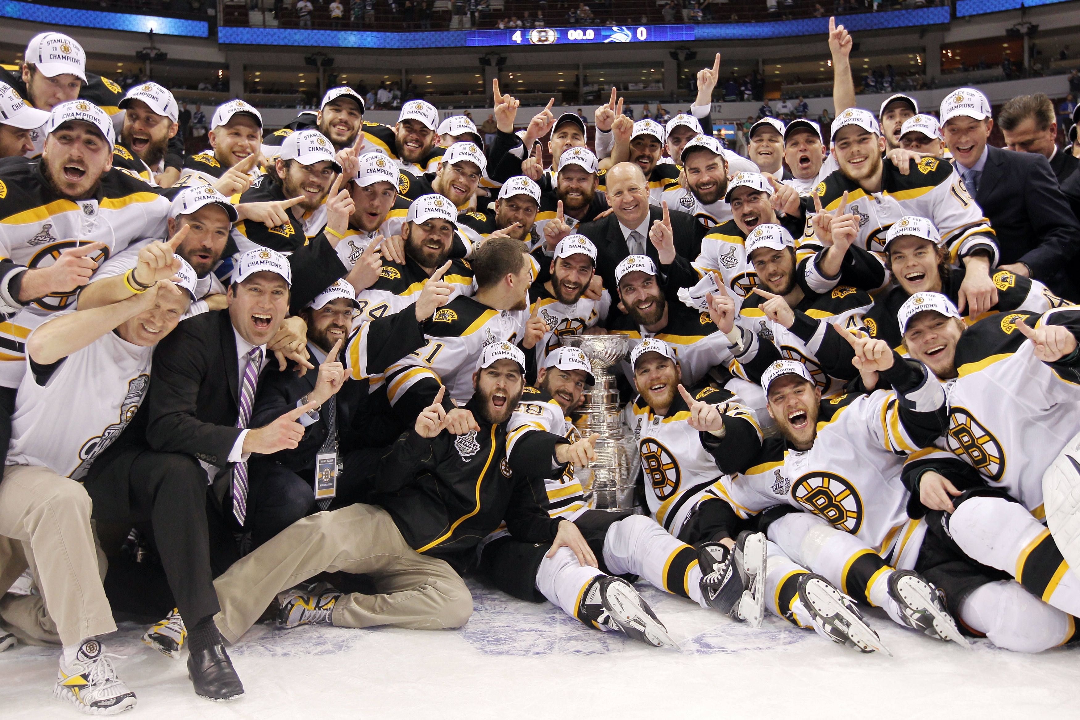 VANCOUVER, BC - JUNE 15:  The Boston Bruins pose with the Stanley Cup after defeating the Vancouver Canucks in Game Seven of the 2011 NHL Stanley Cup Final at Rogers Arena on June 15, 2011 in Vancouver, British Columbia, Canada. The Boston Bruins defeated