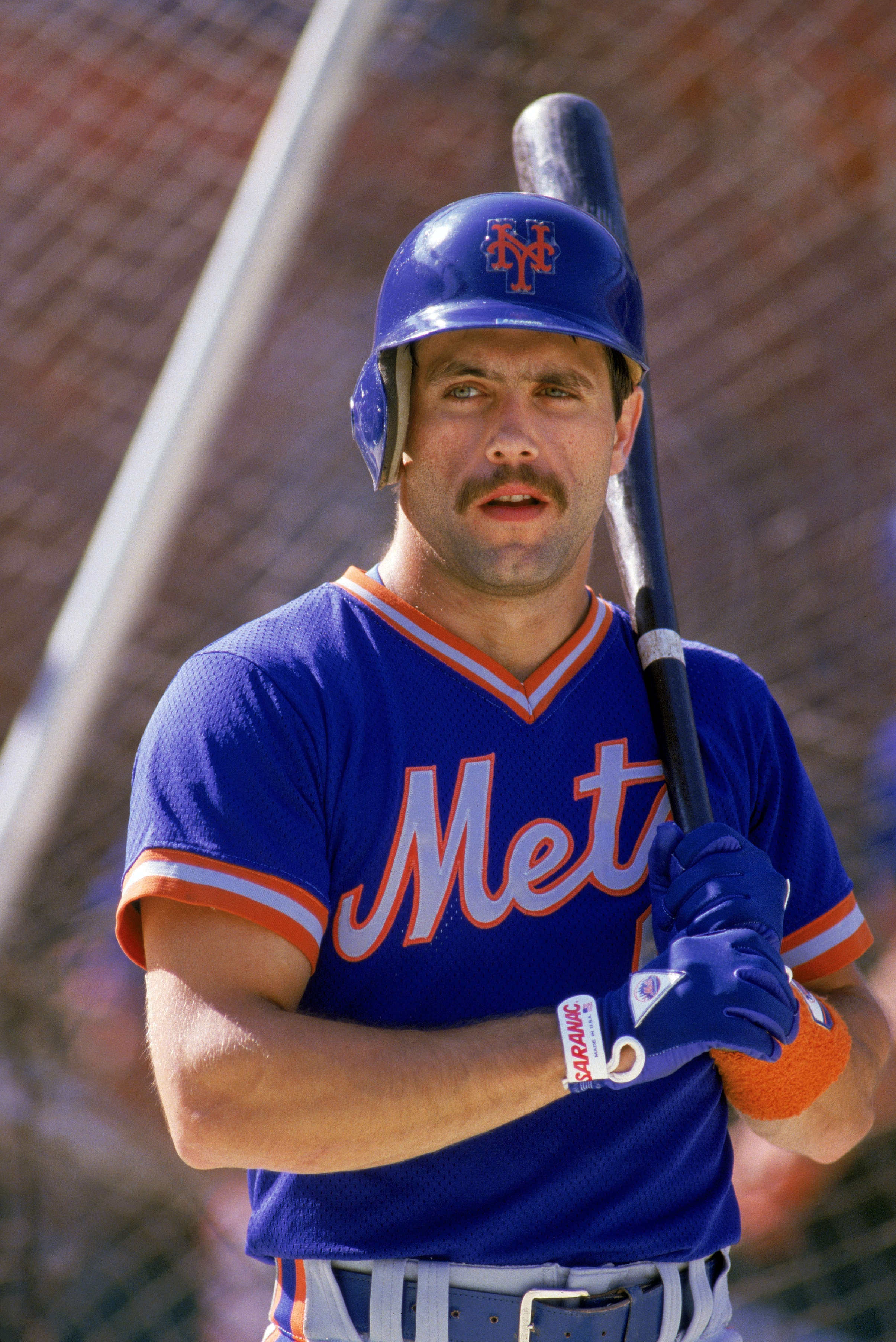 1986:  Wally Backman #6 of the New York Mets looks on during the game against the San Diego Padres at Jack Murphy Stadium circa 1986 in San Diego, California.  (Photo by Rick Stewart/Getty Images)