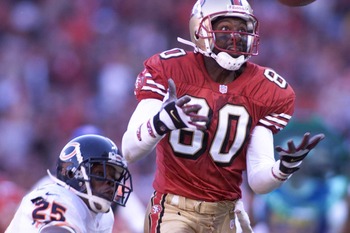 17 Dec 2000: Jerry Rice #80 of the San Francisco 49ers is defended by Jerry Azumah of the Chicago Bears during their game at 3Comm Park in San Francisco, California. San Francisco went on to win 17-0. DIGITAL IMAGE. Mandatory Credit: Jed Jacobsohn/ALLSPOR