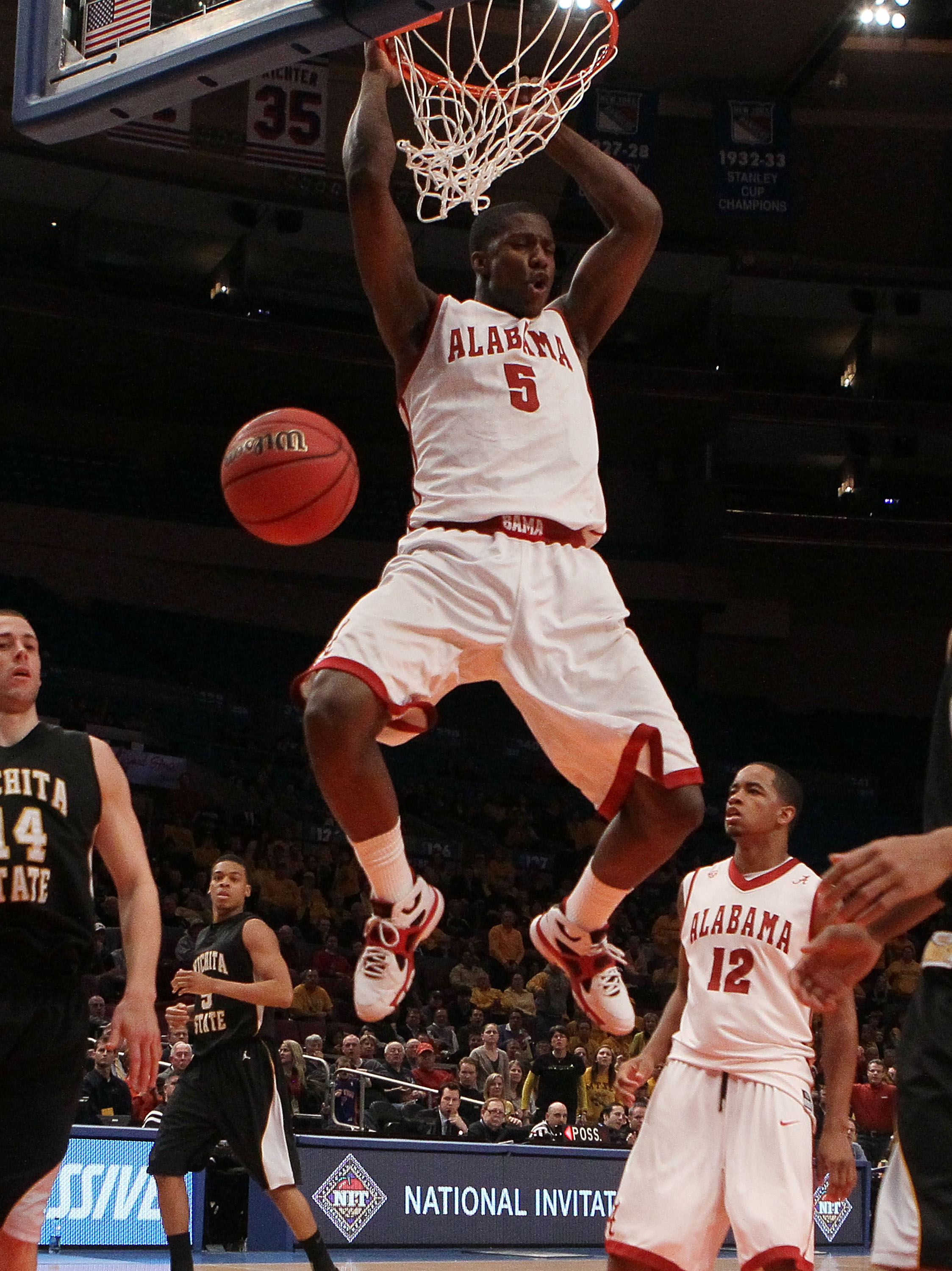 NEW YORK, NY - MARCH 31: Tony Mitchell #5 of the Alabama Crimson Tide dunks against the Wichita State Shockers during the 2011 NIT Championship game on March 31, 2011 at Madison Square Garden in New York City. Wichita State defeated Alabama 66-57.  (Photo