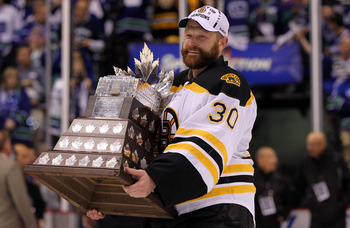 VANCOUVER, BC - JUNE 15:  Tim Thomas #30 of the Boston Bruins is awarded the Conn Smythe Trophy after defeating the Vancouver Canucks in Game Seven of the 2011 NHL Stanley Cup Final at Rogers Arena on June 15, 2011 in Vancouver, British Columbia, Canada.
