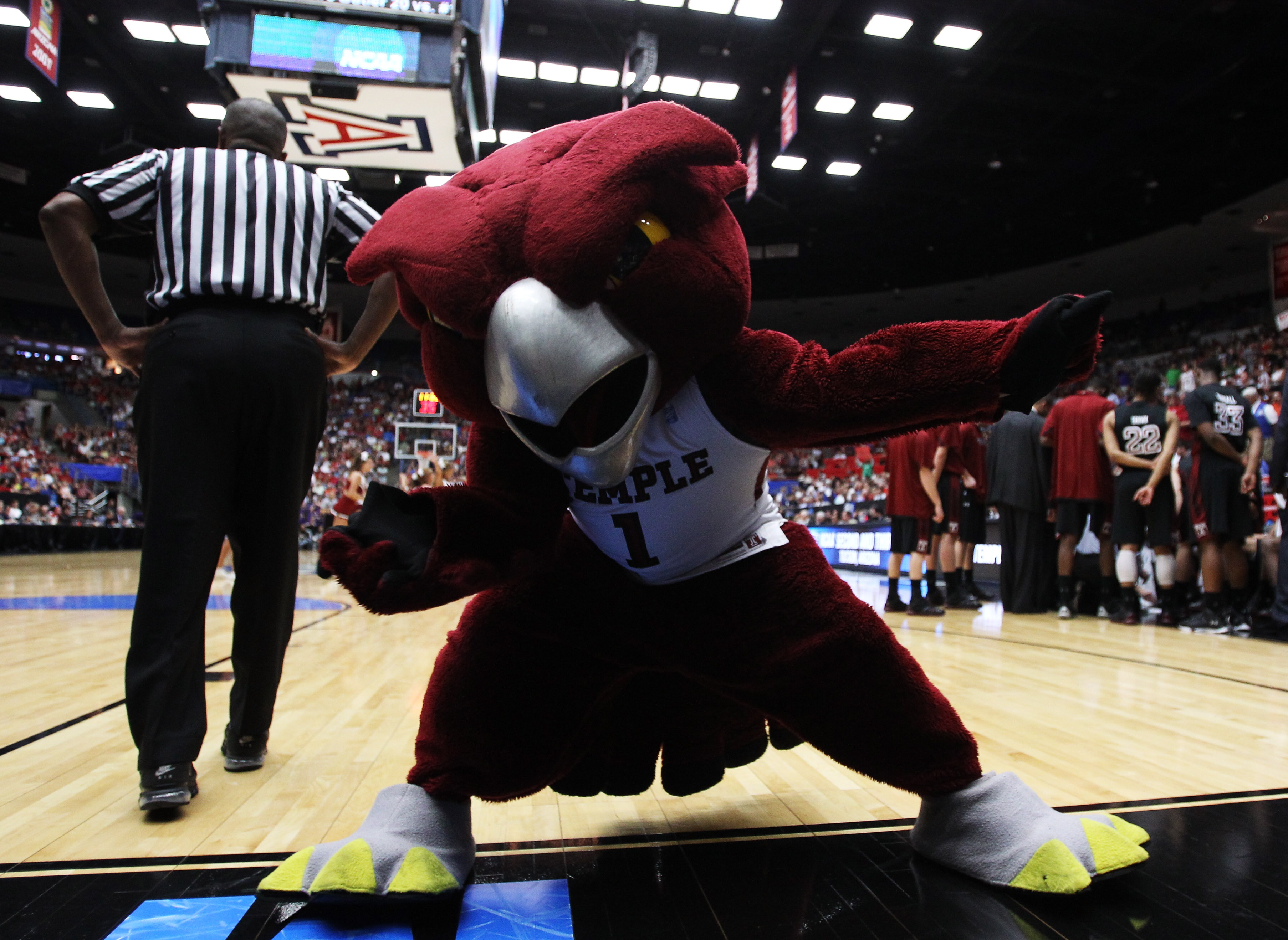 TUCSON, AZ - MARCH 19:  The Temple Owls mascot entertains the crowd during their game against the San Diego State Aztecs during the third round of the 2011 NCAA men's basketball tournament at McKale Center on March 19, 2011 in Tucson, Arizona.  (Photo by
