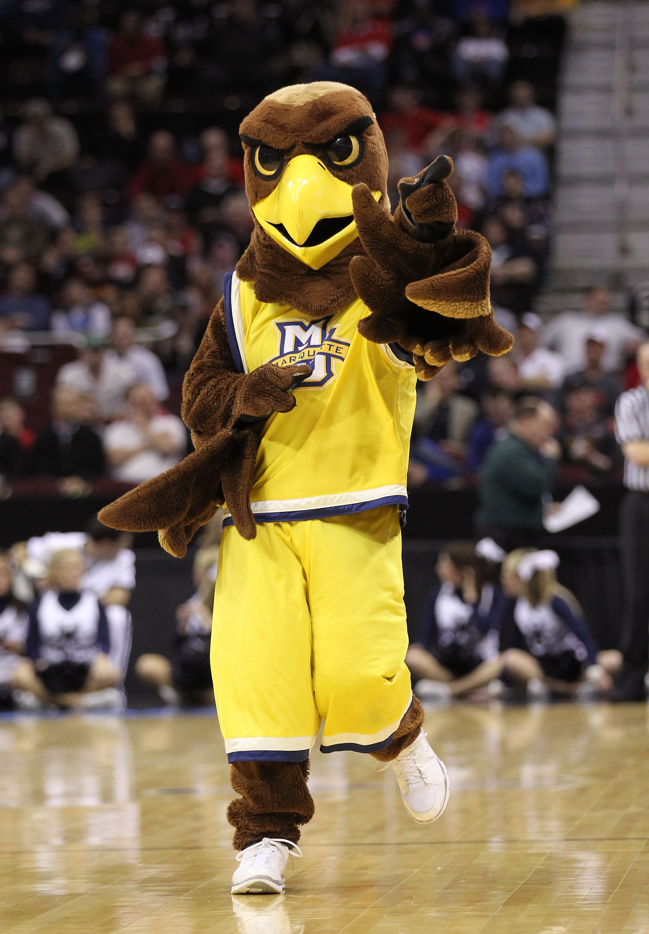 CLEVELAND, OH - MARCH 18: The Marquette Golden Eagles mascot walks on the court during the game against the Xavier Musketeers during the second round of the 2011 NCAA men's basketball tournament at Quicken Loans Arena on March 18, 2011 in Cleveland, Ohio.