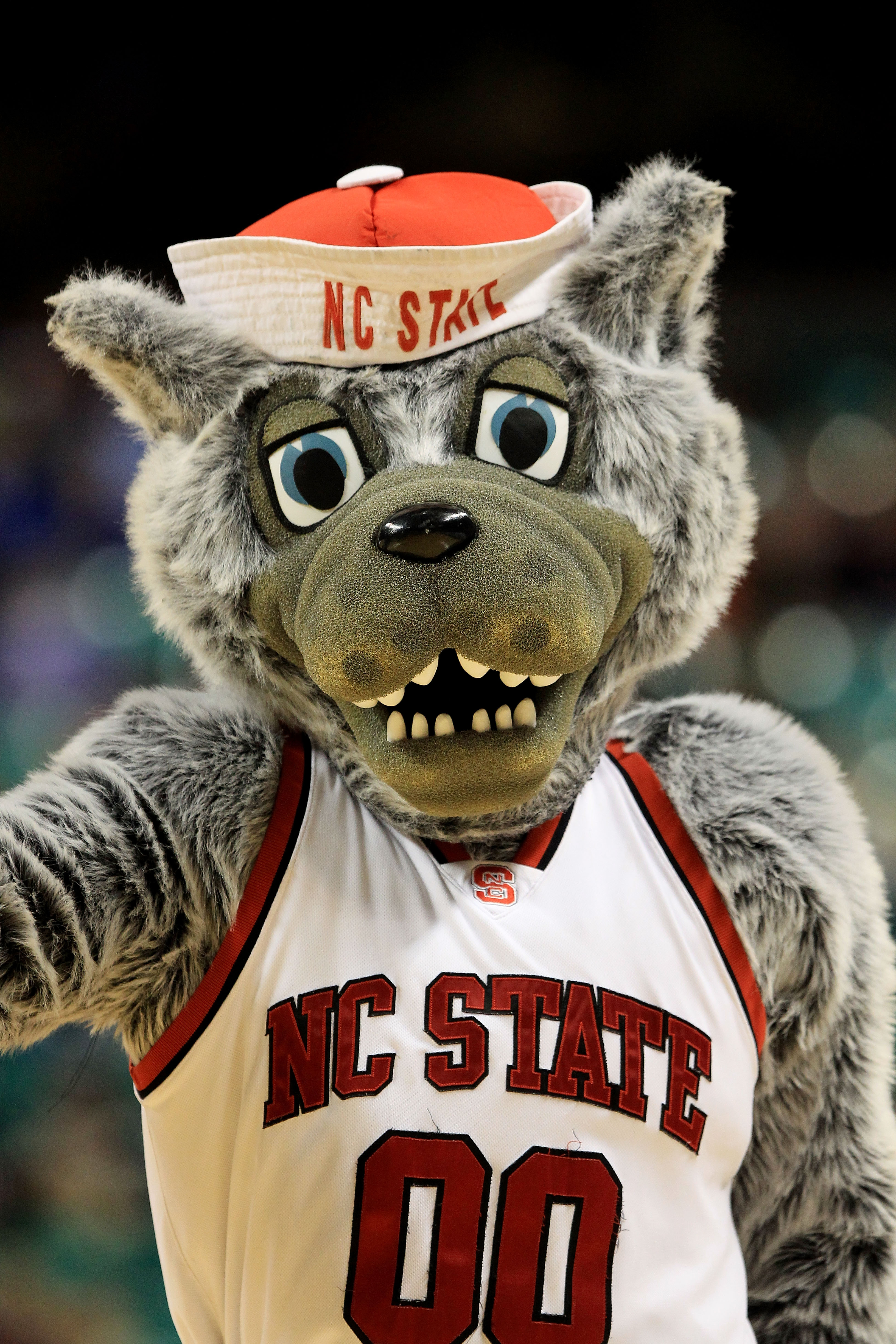 GREENSBORO, NC - MARCH 10:  Mr. Wuf, North Carolina State mascot, performs during the first half of the game against the Maryland Terrapins in the first round of the 2011 ACC men's basketball tournament at the Greensboro Coliseum on March 10, 2011 in Gree
