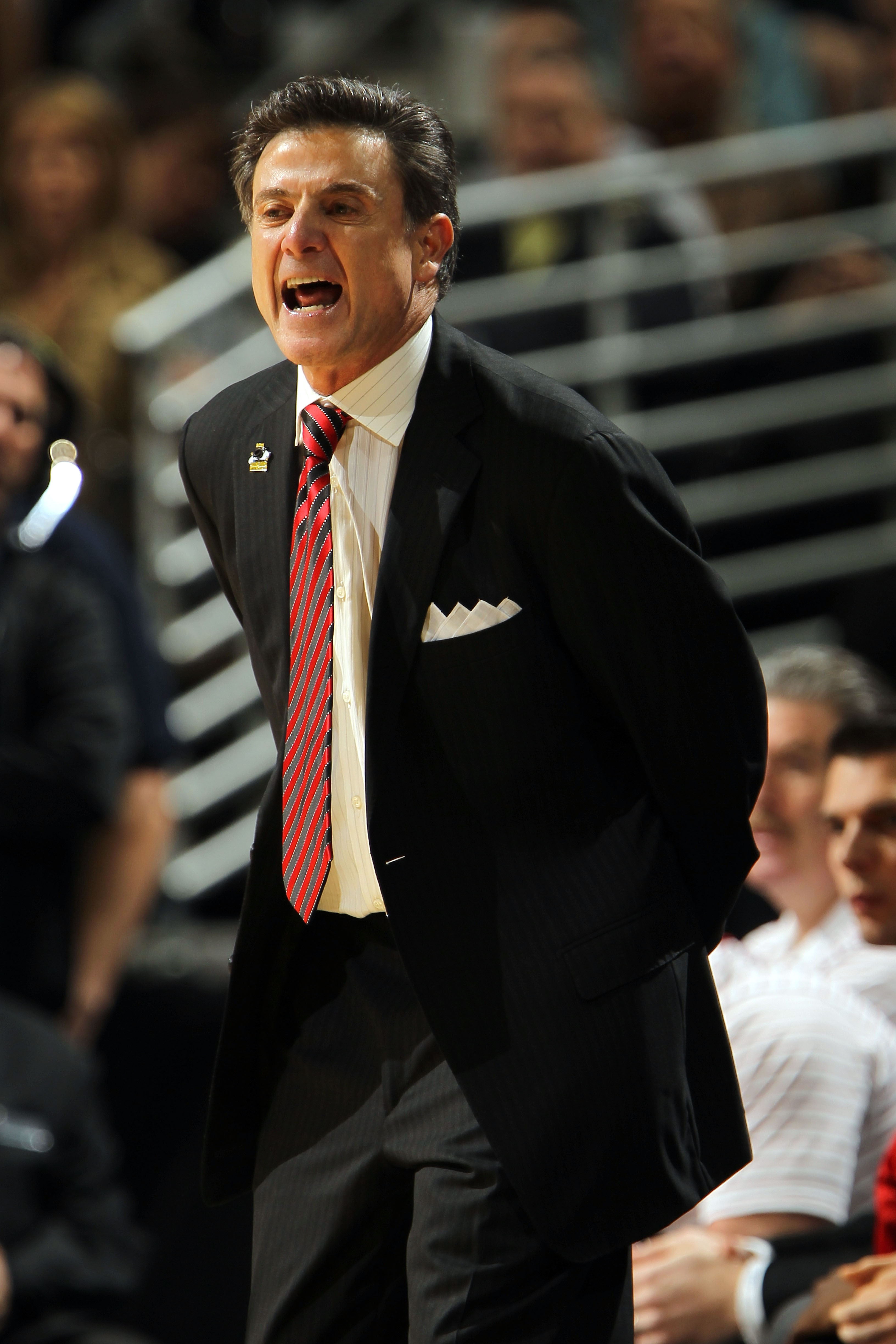 DENVER, CO - MARCH 17:  Head coach Rick Pitino of the Louisville Cardinals looks on from the sidelines against the Morehead State Eagles during the second round of the 2011 NCAA men's basketball tournament at Pepsi Center on March 17, 2011 in Denver, Colo