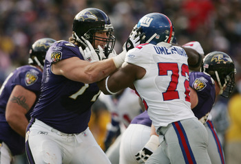 Osi Umenyiora of the New York Giants taunts quarterback Drew