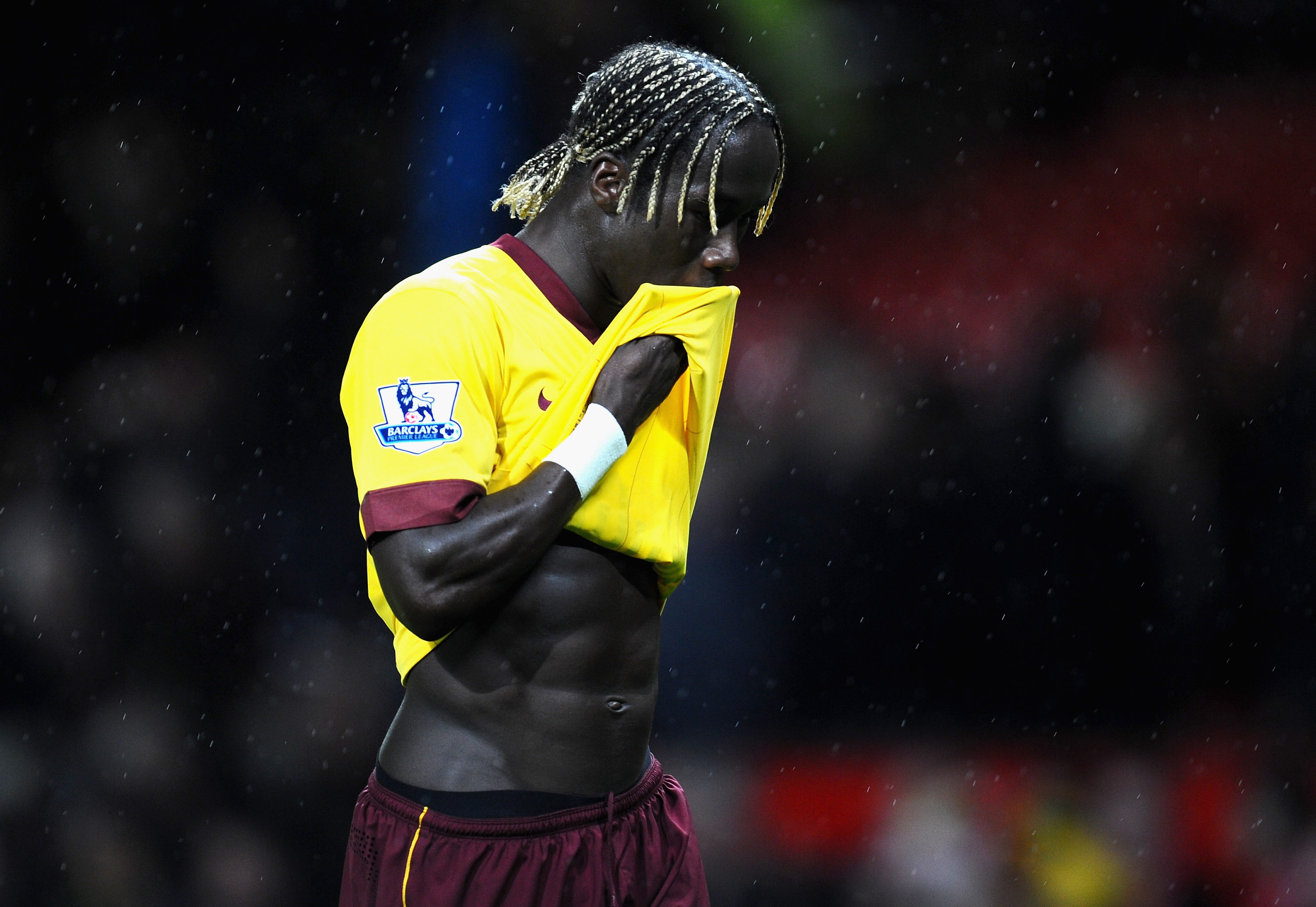 MANCHESTER, ENGLAND - MARCH 12:  Bacary Sagna of Arsenal looks dejected after defeat in the FA Cup sponsored by E.On Sixth Round match between Manchester United and Arsenal at Old Trafford on March 12, 2011 in Manchester, England.  (Photo by Clive Mason/G