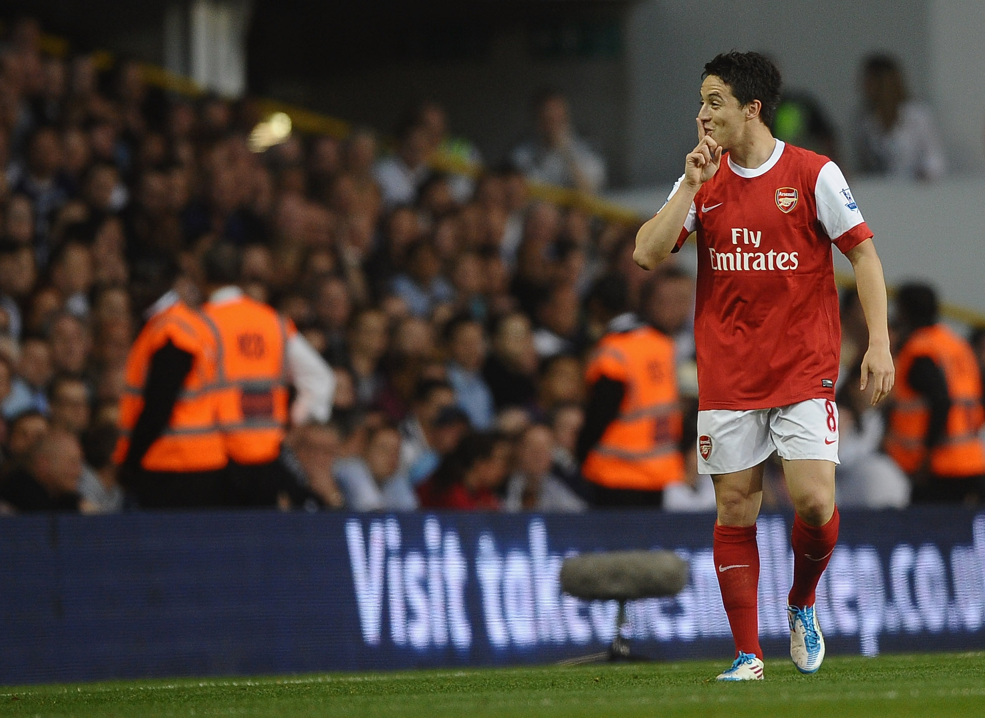 LONDON, ENGLAND - APRIL 20:  Samir Nasri of Arsenal gestures to the Spurs fans after scoring their second goal during the Barclays Premier League match between Tottenham Hotspur and Arsenal at White Hart Lane on April 20, 2011 in London, England.  (Photo