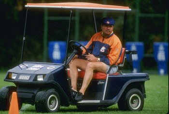 Jul 1990:  Head coach Mike Ditka of the Chicago Bears watches his team from a golf cart during Bears Training Camp at the University of Wisconsin-Platteville in Platteville, Wisconsin.  Mandatory Credit: Jonathan Daniel  /Allsport