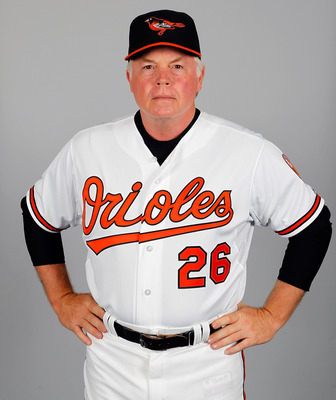 Baltimore Orioles manager, BUCK SHOWALTER, shakes hands with