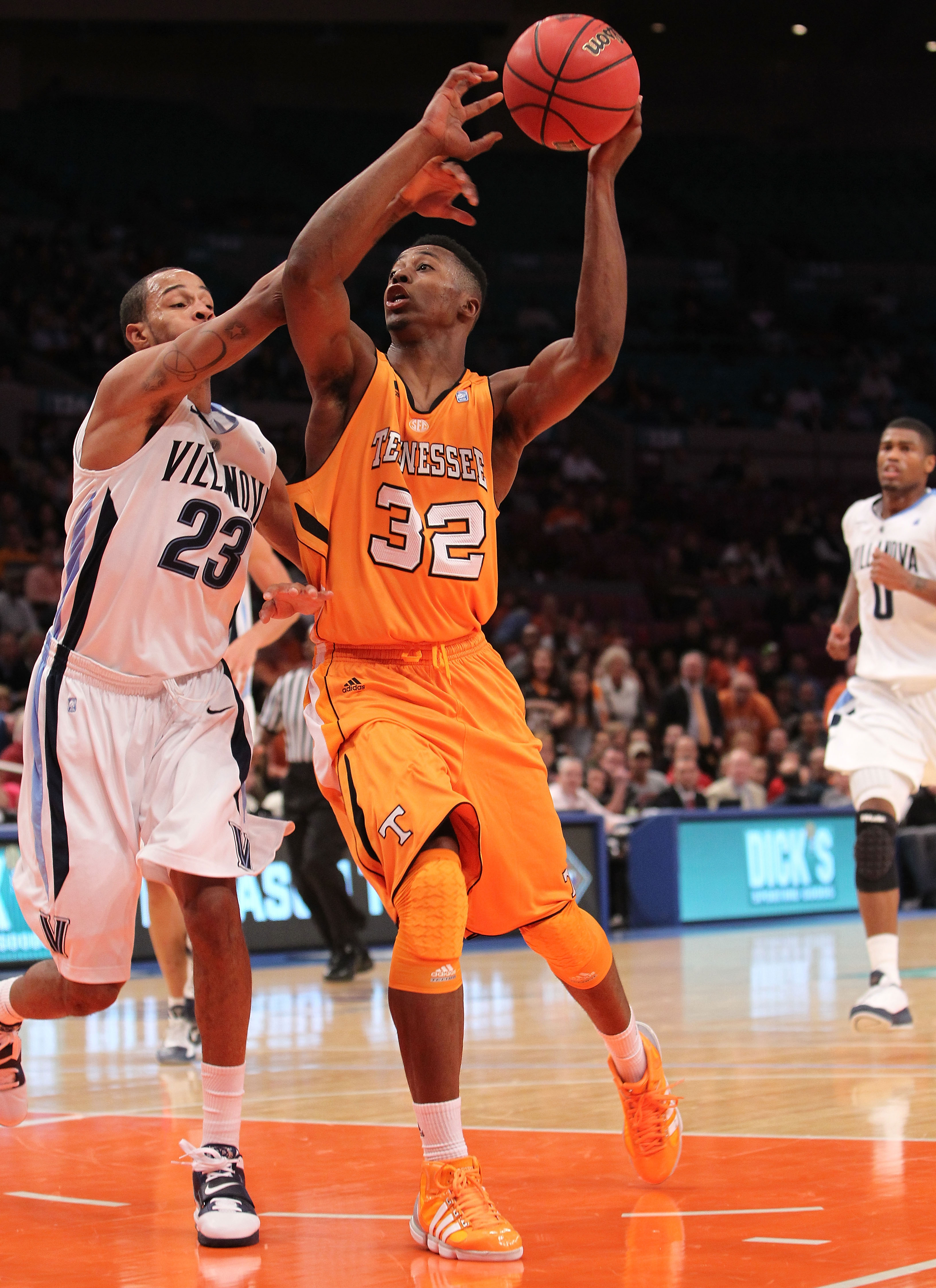 NEW YORK - NOVEMBER 26:  Scotty Hopson #32 of the Tennessee Volunteers is fouled by Dominic Cheek #23 of the Villanova Wildcats  during the Championship game at Madison Square Garden on November 26, 2010 in New York City.  (Photo by Nick Laham/Getty Image