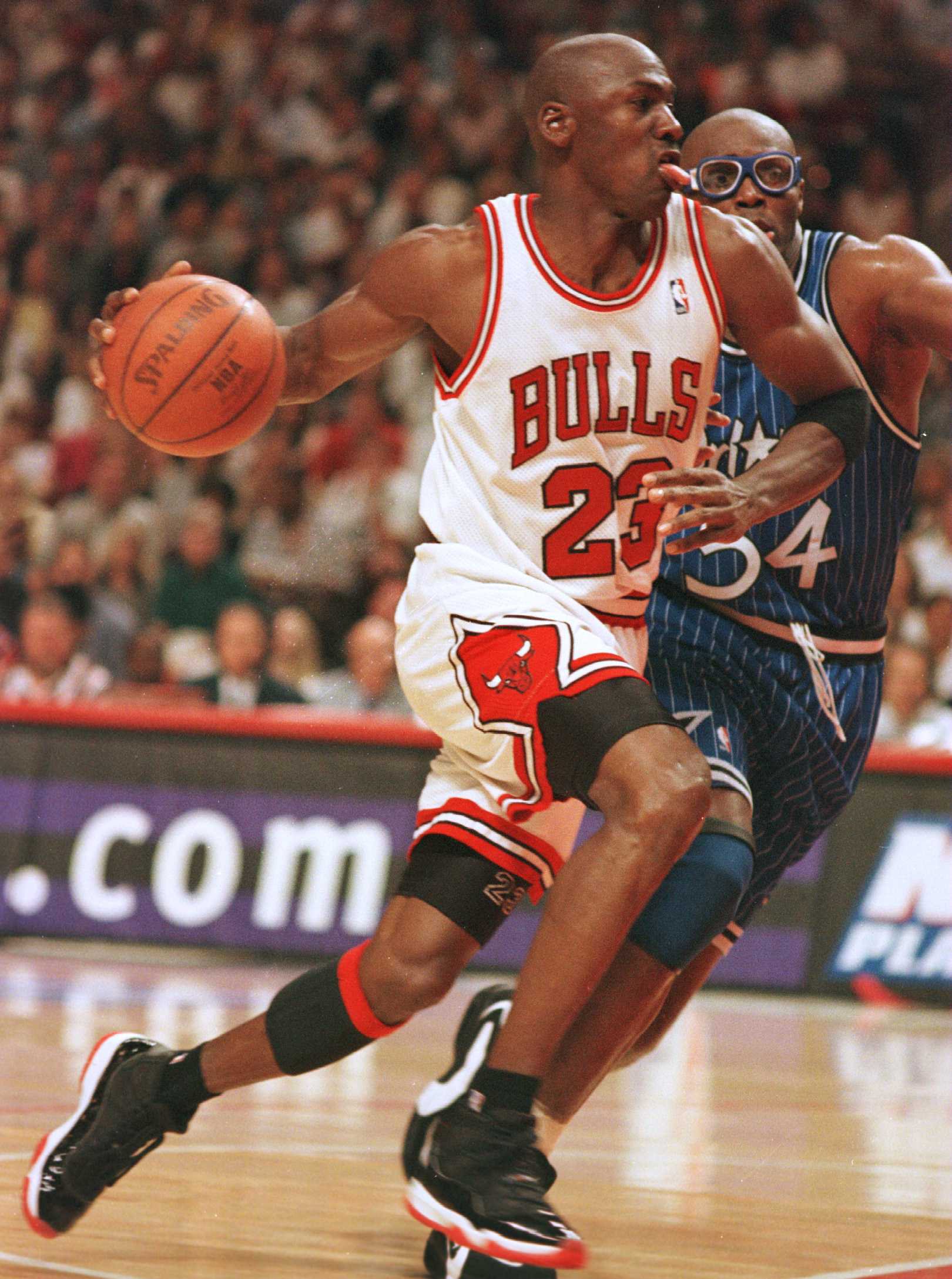 19 May 1996:  Guard Michael Jordan of the Chicago Bulls drives around forward Horace Grant of the Orlando Magic during the third quarter of game one of the Eastern Conference Championships at the United Center in Chicago, Illinois. The Bulls went on to be