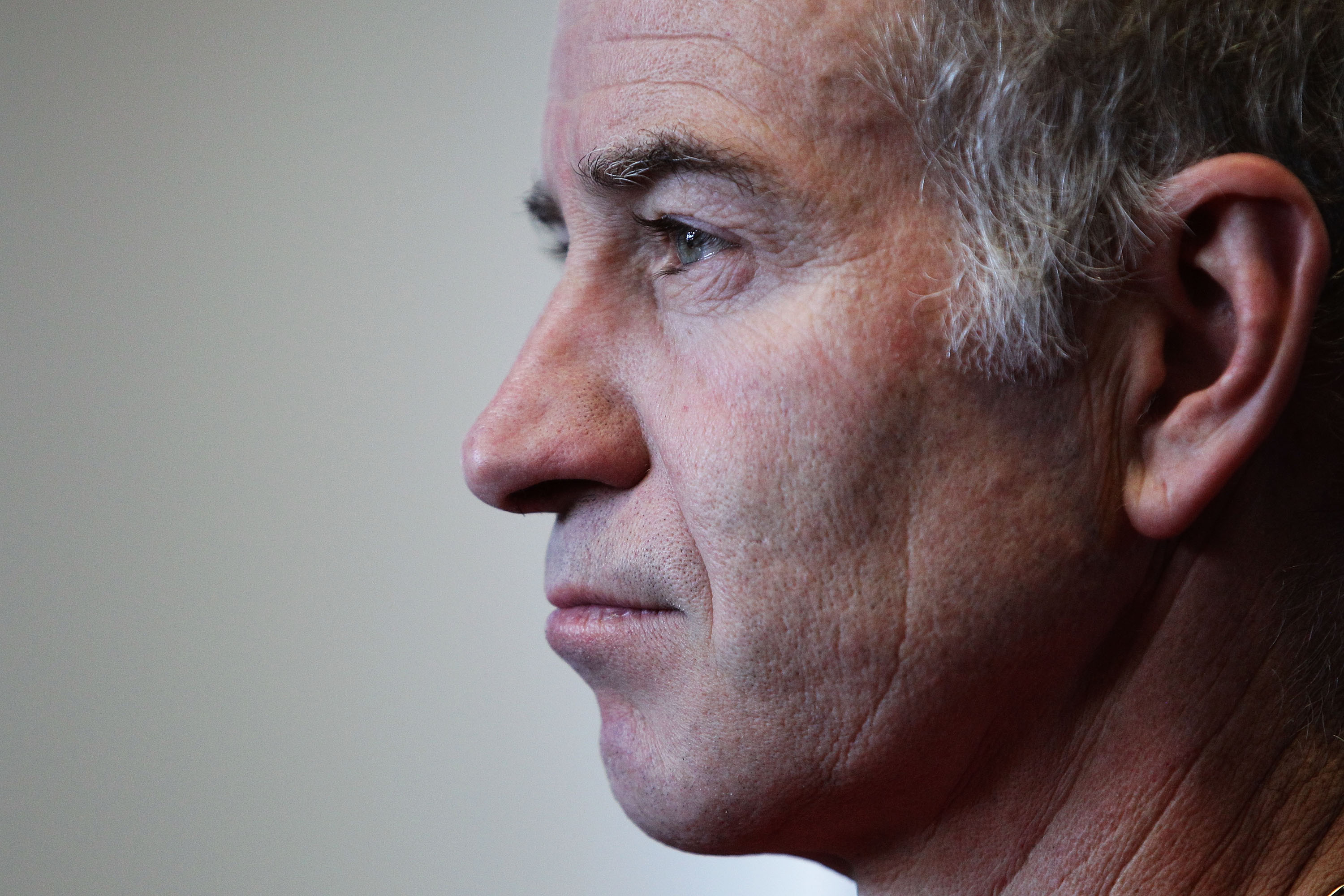SYDNEY, AUSTRALIA - NOVEMBER 10: Tennis player John McEnroe of the United States look on during a media session for the Champions Downunder Tournament at Events NSW on November 10, 2010 in Sydney, Australia. (Photo by Brendon Thorne/Getty Images)
