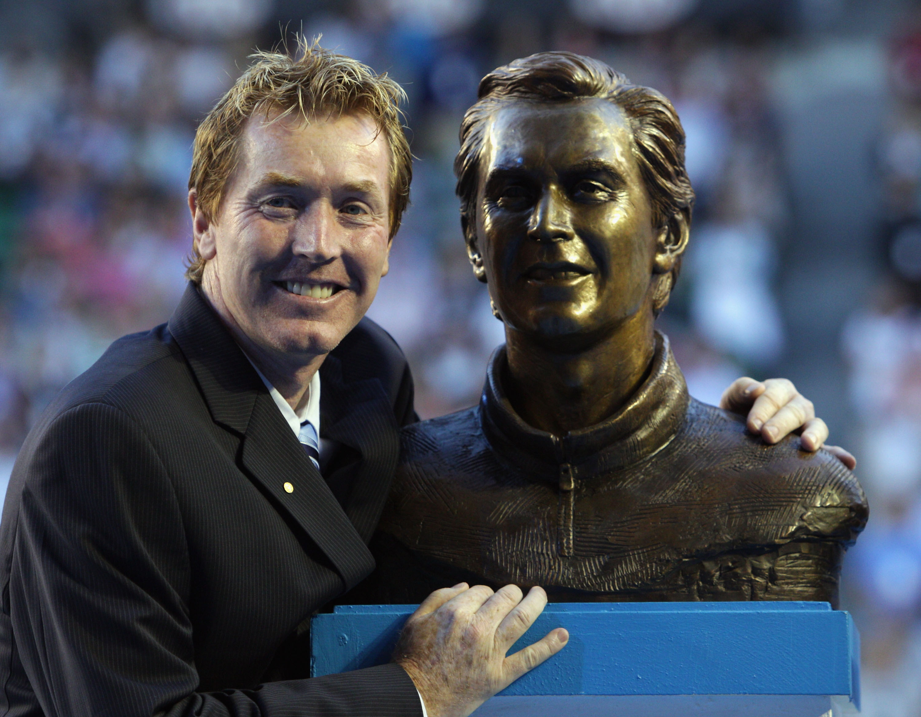 MELBOURNE, AUSTRALIA - JANUARY 26: Former tennis player Mark Woodforde of Australia poses after being inducted into the Australian Tennis Hall of Fame during the Australia Day presentation in Rod Laver Arena during day nine of the 2010 Australian Open at