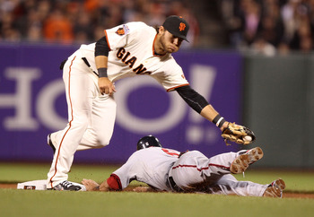 SAN FRANCISCO, CA - JUNE 6:  Ian Desmond #6 of the Washington Nationals steals second base past Brandon Crawford #35 of the San Francisco Giants during an MLB game at AT&T Park on June 6, 2011 in San Francisco, California. (Photo by Jed Jacobsohn/Getty Im
