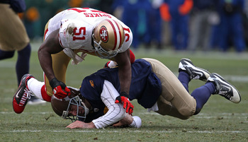 Sourdeath Sam on X: Takeo Spikes and Patrick Willis with clubs for hands  is one of the most legendary 49ers pics of all time   / X