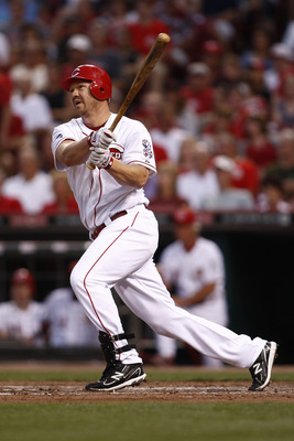 CINCINNATI, OH - JUNE 17:  Scott Rolen #27 of the Cincinnati Reds hits a solo home run during the game against the Toronto Blue Jays on June 17, 2011 at Great American Ball Park in Cincinnati, Ohio.  The Toronto Blue Jays defeated the Cincinnati Reds 3-2.