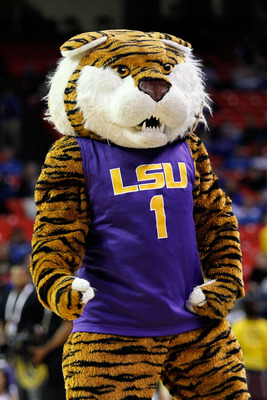 ATLANTA, GA - MARCH 10:  Mascot Mike the Tiger of the LSU Tigers cheers during their game against the Vanderbilt Commodores in the first round of the SEC Men's Basketball Tournament at the Georgia Dome on March 10, 2011 in Atlanta, Georgia.  (Photo by Kev