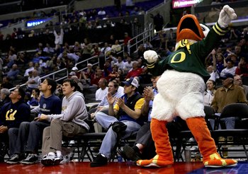 LOS ANGELES, CA - MARCH 09:  The mascot for the Oregon Ducks celebrates as the Ducks make a comeback in the second half against the Washington Huskies in the quarterfinals of the 2006 Pacific Life Pac-10 Men's Basketball Tournament on March 9, 2006 at Sta