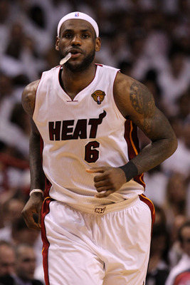 MIAMI, FL - JUNE 12:  LeBron James #6 of the Miami Heat runs down court while taking on the Dallas Mavericks in Game Six of the 2011 NBA Finals at American Airlines Arena on June 12, 2011 in Miami, Florida. NOTE TO USER: User expressly acknowledges and ag