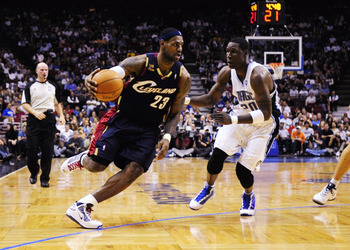 ORLANDO, FL - NOVEMBER 11:  LeBron James #23 of the Cleveland Cavaliers drives against Mickael Pietrus #20 of the Orlando Magic during the game on November 11, 2009 at Amway Arena in Orlando, Florida. NOTE TO USER: User expressly acknowledges and agrees t