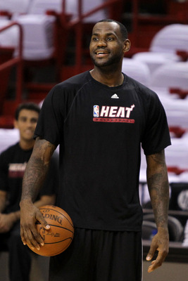 MIAMI, FL - JUNE 11:  LeBron James #6 of the Miami Heat looks on during practice prior to Game 6 of the 2011 NBA Finals against the Dallas Mavericks at the American Airlines Arena on June 11, 2011 in miami, Florida. Game 6 will be played on June 12. NOTE