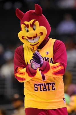 LOS ANGELES, CA - MARCH 09:  Sparky, the mascot for the Arizona State Sun Devils, performs on the court during a break in the game between the Sun Devils and the Oregon Ducks in the first round of the 2011 Pacific Life Pac-10 Men's Basketball Tournament a