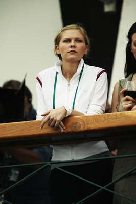 LONDON - JULY 1:  Actress Kirsten Dunst is pictured during the filming of the movie 'Wimbledon' during the Women's Quarter Finals at the Wimbledon Lawn Tennis Championships held on July 1, 2003 at the All England Lawn Tennis and Croquet Club, in Wimbledon