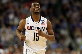 HOUSTON, TX - APRIL 04:  Kemba Walker #15 of the Connecticut Huskies reacts after a play against the Butler Bulldogs during the National Championship Game of the 2011 NCAA Division I Men's Basketball Tournament at Reliant Stadium on April 4, 2011 in Houst