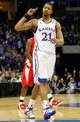 TULSA, OK - MARCH 18:  Markieff Morris #21 of the Kansas Jayhawks reacts to a play against the Boston University Terriers during the second round of the 2011 NCAA men's basketball tournament at BOK Center on March 18, 2011 in Tulsa, Oklahoma.  (Photo by T