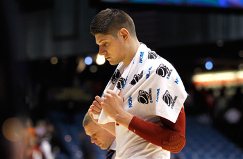 DAYTON, OH - MARCH 16:  Nikola Vucevic #5 of the USC Trojans walks off the court after being defeated by the Virginia Commonwealth Rams during the first round of the 2011 NCAA men's basketball tournament at UD Arena on March 16, 2011 in Dayton, Ohio.  (Ph