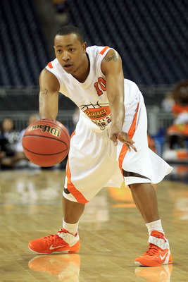 HOUSTON, TX - APRIL 01:  Andrew Goudelock #10 of the College of Charleston passes the ball in the 2011 Reese's College All-Star Game after practice for the 2011 Final Four of the NCAA Division I Men's Basketball Tournament at Reliant Stadium on April 1, 2