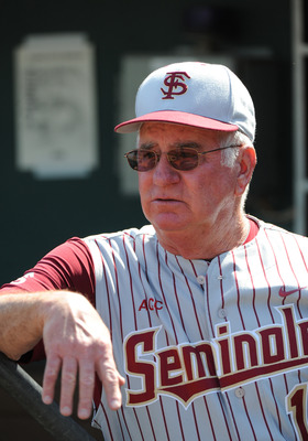 CLEARWATER, FL - FEBRUARY 24:  Manager Mike Martin of  the Florida State Seminoles watches warmups against the Philadelphia Phillies February 24, 2011 at Bright House Field in Clearwater, Florida.  (Photo by Al Messerschmidt/Getty Images)