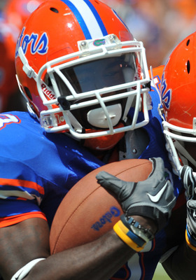 GAINESVILLE, FL - APRIL 9: Running back Chris Rainey #3 of the Florida Gators runs upfield during the Orange and Blue spring football game April 9, 2011 at Ben Hill Griffin Stadium in Gainesville, Florida. (Photo by Al Messerschmidt/Getty Images)